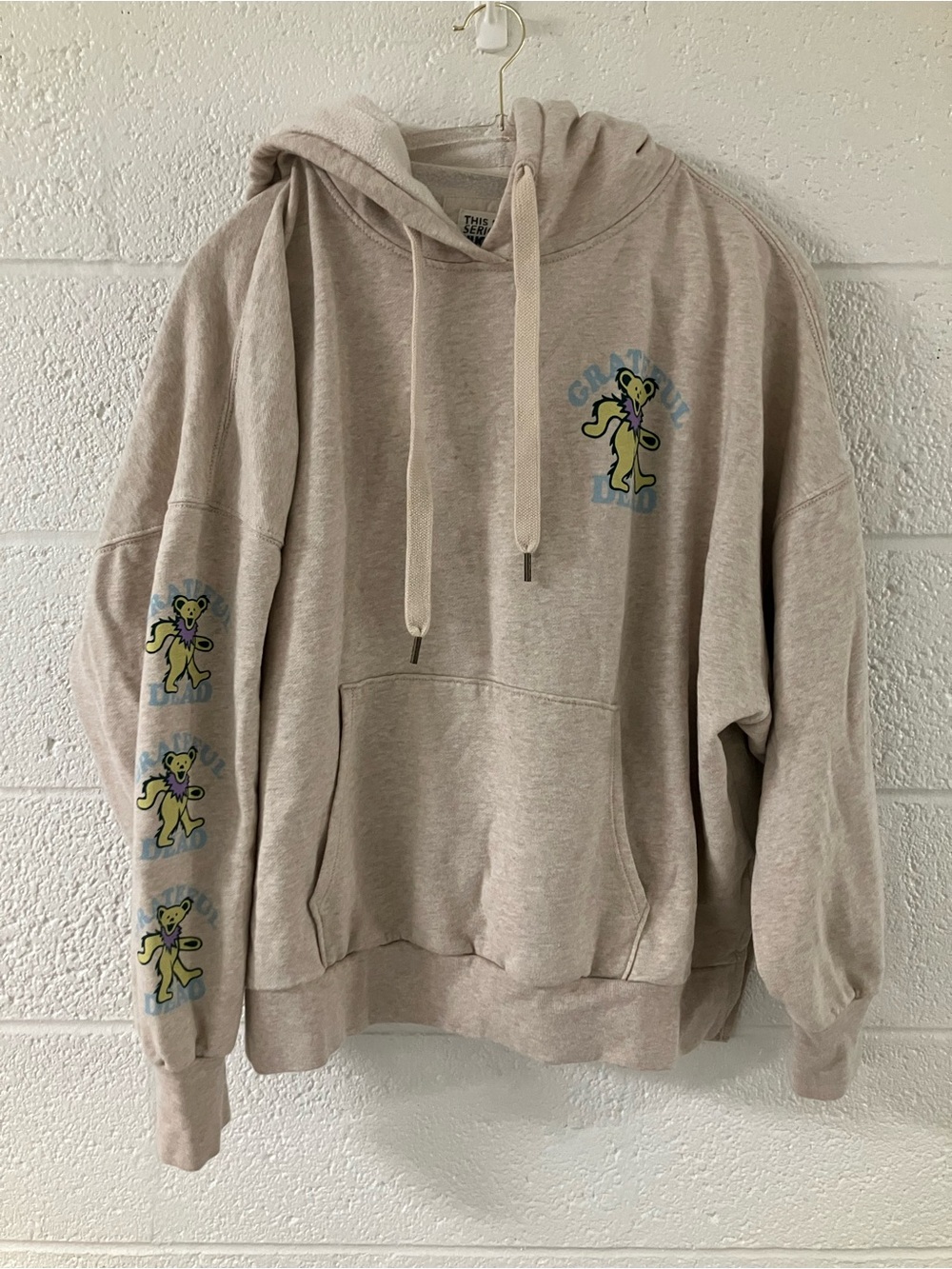 American Eagle Outfitters Beige Hoodie with Yellow Dancing Bear Prints